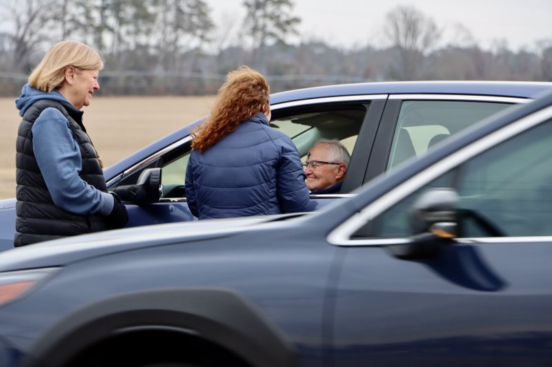 Don Foraker pulls up across from Zion United Methodist Church on Broadkill Road in Milton to get ashes to go. Pat Bollinger, Zion pastor, left, and Katie Joseph are there to perform the Ash Wednesday tradition Feb. 18. BILL SHULL PHOTOS